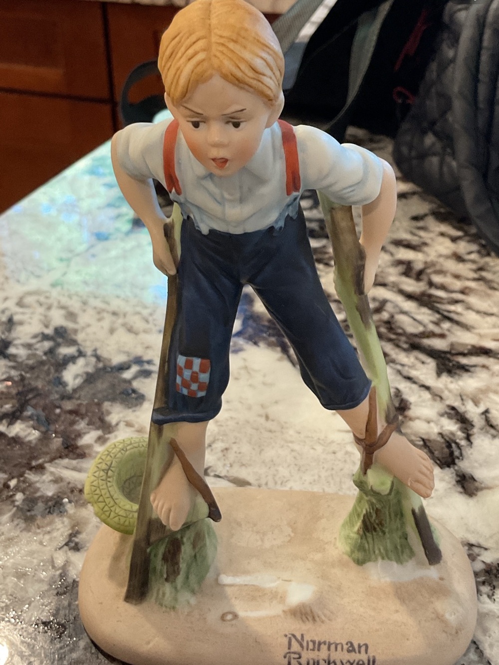 Norman Rockwell Porcelain Boy on Stilts in Blue, Red, Cream and Blonde